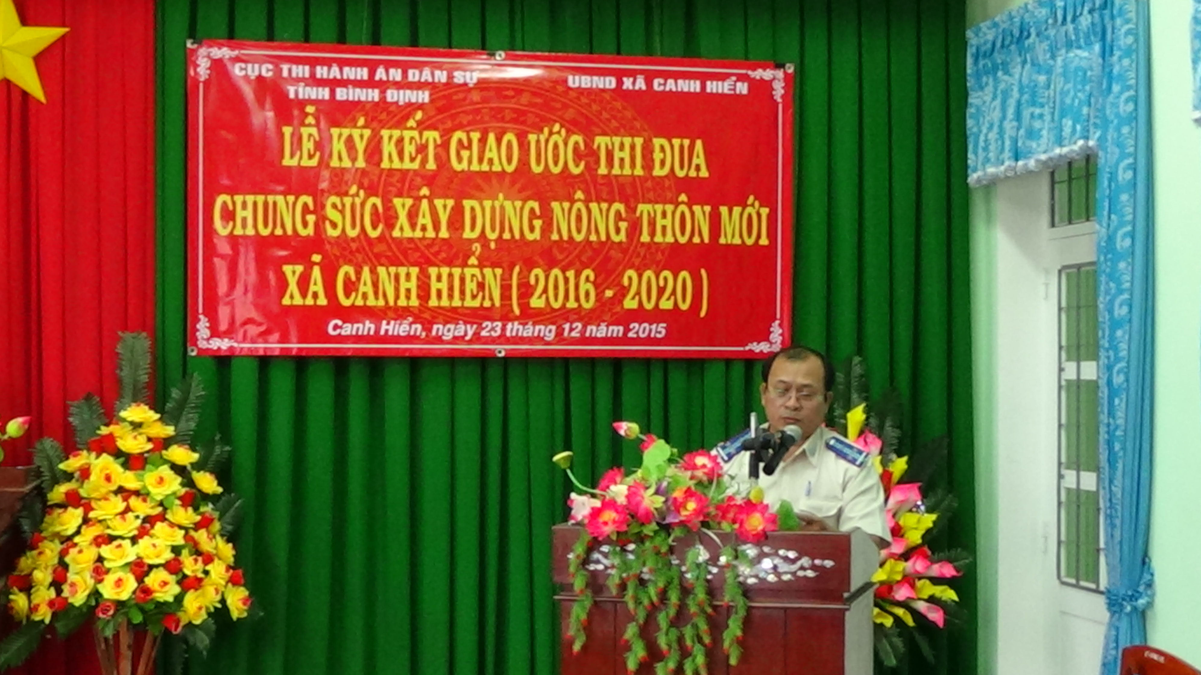 Cục Thi hành án dân sự tỉnh Bình Định ký kết giao ước thi đua chung sức xây dựng nông thôn mới, giai đoạn 2016 – 2020 tại xã Canh Hiển, huyện Vân Canh, tỉnh Bình Định.