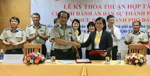 Cục Thi hành án dân sự và Bưu điện TP Đà Nẵng ký kết thỏa thuận hợp tác cung cấp dịch vụ tiếp nhận hồ sơ và chuyển phát kết quả giải quyết thủ tục hành chính